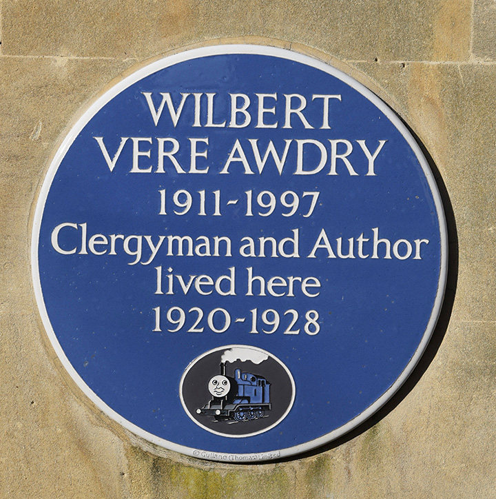 Blue plaque commemorating Reverend Wilbert Vere Awdry on the stone wall at Lorne House