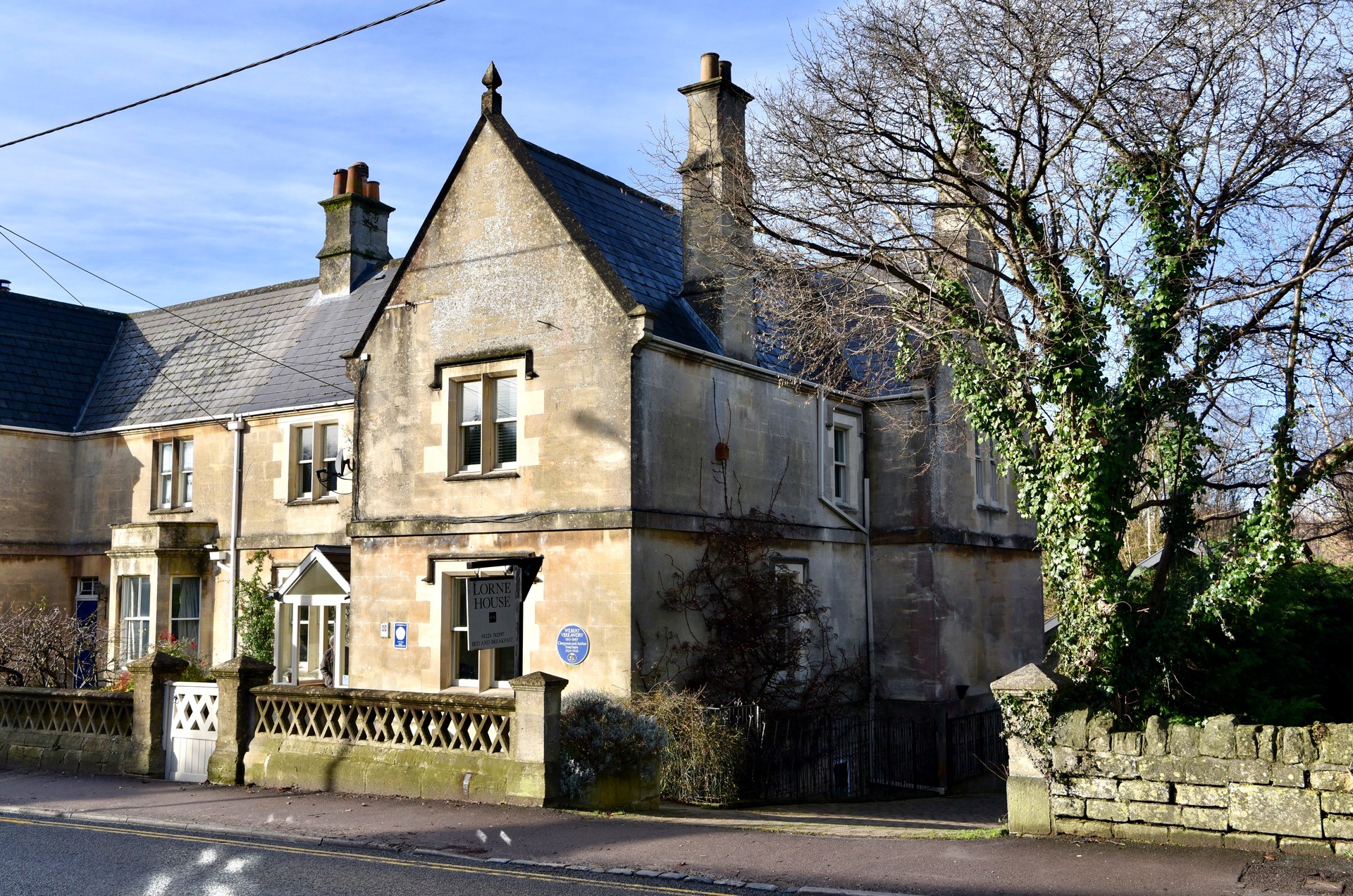 Stone exterior of Lorne House beside London Road in Box